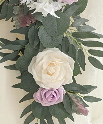 Silky Flower Store Artificial Eucalyptus Garland with Flowers, Lilac Lavender Floral Table Runner, 6ft 13.75in wide 3.5in high 11 11 Product: Floroom 6ft Artificial Eucalyptus Garland with Flowers Fake Greenery Faux Floral Vine Garland for Table Decor Wedding Centerpieces Bridal Shower Party Decorations, Lilac & Lavender