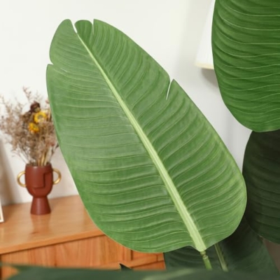 Product: Ferrgoal Artificial Bird of Paradise Plants 5Ft Fake Tropical Palm Tree with 10 Trunks in Pot and Woven Seagrass Belly Basket Perfect Faux Plant for Home Indoor Outdoor Office Modern Decor Green