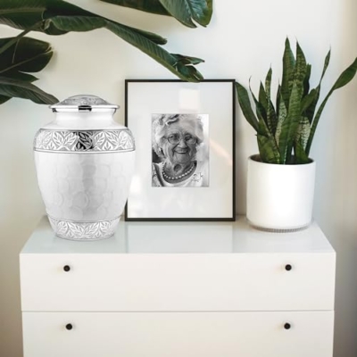 Silky Flower Store Trupoint Memorials Cremation Urn for Human Ashes, Large White Silver Lined Adult Memorial Urn, 9.5 x 7 inches 15 15 Product: Trupoint Memorials Cremation Urns for Human Ashes, Decorative Burial Urn for Adult Men and Women, Large White with Silver Lining