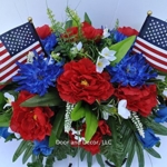 Product: Summer Patriotic Cemetery Flowers with Red Roses, Blue Spider Mums, Blue Roses, and White Forget-me-nots headstone saddle arrangement