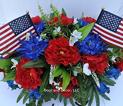 Product: Summer Patriotic Cemetery Flowers with Red Roses, Blue Spider Mums, Blue Roses, and White Forget-me-nots headstone saddle arrangement