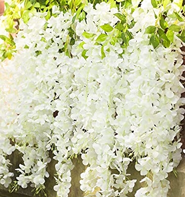 Silky Flower Store White Artificial Wisteria Garland, Silk Hanging Flower Vine, 24 Pack, 3.6ft 7 7 Product: UNIQU 24 Pack 3.6 Feet/Piece White Artificial Flowers Fake Wisteria Garland Hanging Wisteria Silk Flowers for Home Garden Weddings Party Decor