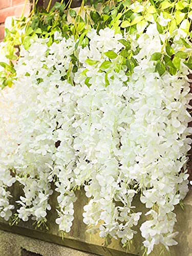 Silky Flower Store White Artificial Wisteria Garland, Silk Hanging Flower Vine, 24 Pack, 3.6ft 1 1 Product: UNIQU 24 Pack 3.6 Feet/Piece White Artificial Flowers Fake Wisteria Garland Hanging Wisteria Silk Flowers for Home Garden Weddings Party Decor