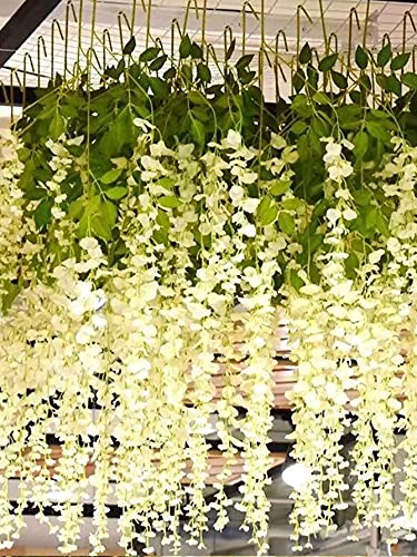 Silky Flower Store White Artificial Wisteria Garland, Silk Hanging Flower Vine, 24 Pack, 3.6ft 5 5 Product: UNIQU 24 Pack 3.6 Feet/Piece White Artificial Flowers Fake Wisteria Garland Hanging Wisteria Silk Flowers for Home Garden Weddings Party Decor