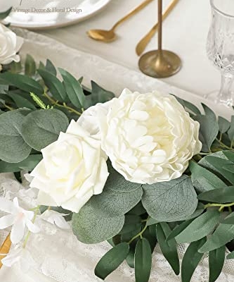 Silky Flower Store Artificial Eucalyptus Garland with Flowers, Ivory White Table Decor, 6ft, 13.75 x 3.5in 10 10 Product: Floroom 6ft Artificial Eucalyptus Garland with Flowers Fake Greenery Faux Floral Vine Garland for Table Decor Wedding Centerpieces Bridal Shower Party Decorations, Ivory White