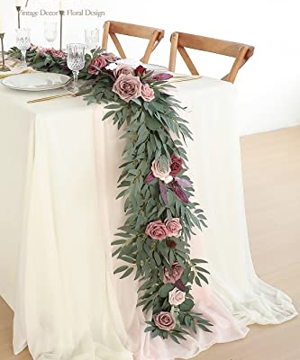 Silky Flower Store Artificial Eucalyptus Garland with Flowers, Dusty Rose Mauve, 6ft, 13.75in width, 3.5in height 7 7 Product: Floroom 6ft Artificial Eucalyptus Garland with Flowers Fake Greenery Faux Floral Vine Garland for Table Decor Wedding Centerpieces Bridal Shower Party Decorations, Dusty Rose & Mauve