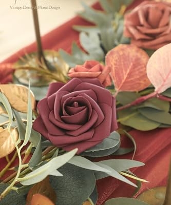Silky Flower Store Artificial Eucalyptus Garland with Flowers, Burnt Orange Terracotta Faux Floral Table Runner, 6ft 9 9 Product: Floroom 6ft Artificial Eucalyptus Garland with Flowers Fake Greenery Burnt Orange Faux Floral Vine Garland for Table Decor Wedding Centerpieces Bridal Shower Party Decorations, Terracotta