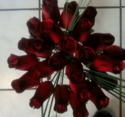 Product: Beautiful Wood Roses 2 Dozen Red with Black Tips with Onion grass