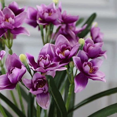 Product: LMJYU Artificial Flowers for Decoration Artificial Daffodils Flowers with Ceramic Vase Narcissus Fake Silk Flower Arrangement