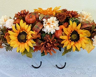 Silky Flower Store Fall Cemetery Saddle Artificial Grave Flowers, Sunflowers Pumpkins, UV Waterproof Silk Florals, 27 x 14 x 10 inches 12 12 Product: Silk Florals & Frills Fall Cemetery Saddle with Pumpkins and Sunflowers, Fall Grave Headstone Flowers
