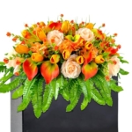Product: FLOWERIA Artificial Cemetery Flowers - Outdoor Grave Saddle for Headstone Decorations with Orange Roses Tulips