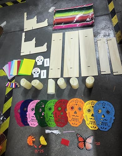 Product: SmoothNovelty 89 Pcs Day of The Dead Decorations 9 Mexican Papel Picado 1 Table Runner 50 Marigold Flower Heads 10 Butterflies 6 LED Candles 1 Display Stand 10 Paper Frames 2 Wood Skull Signs